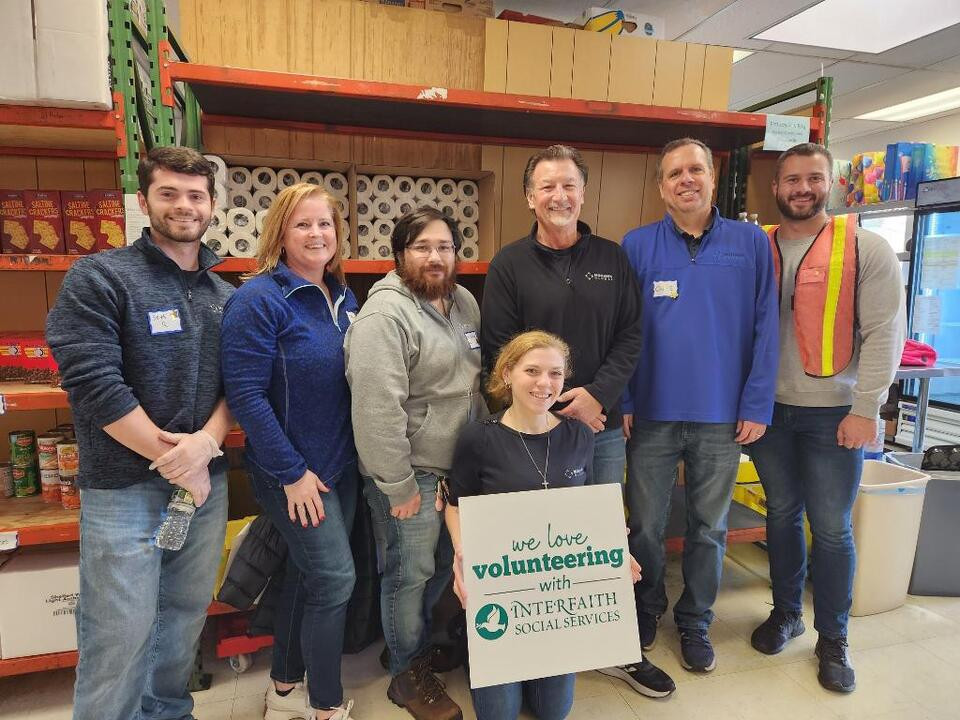 Our Boston team volunteering at InterFaith Social Services in Quincy, Massachusetts.