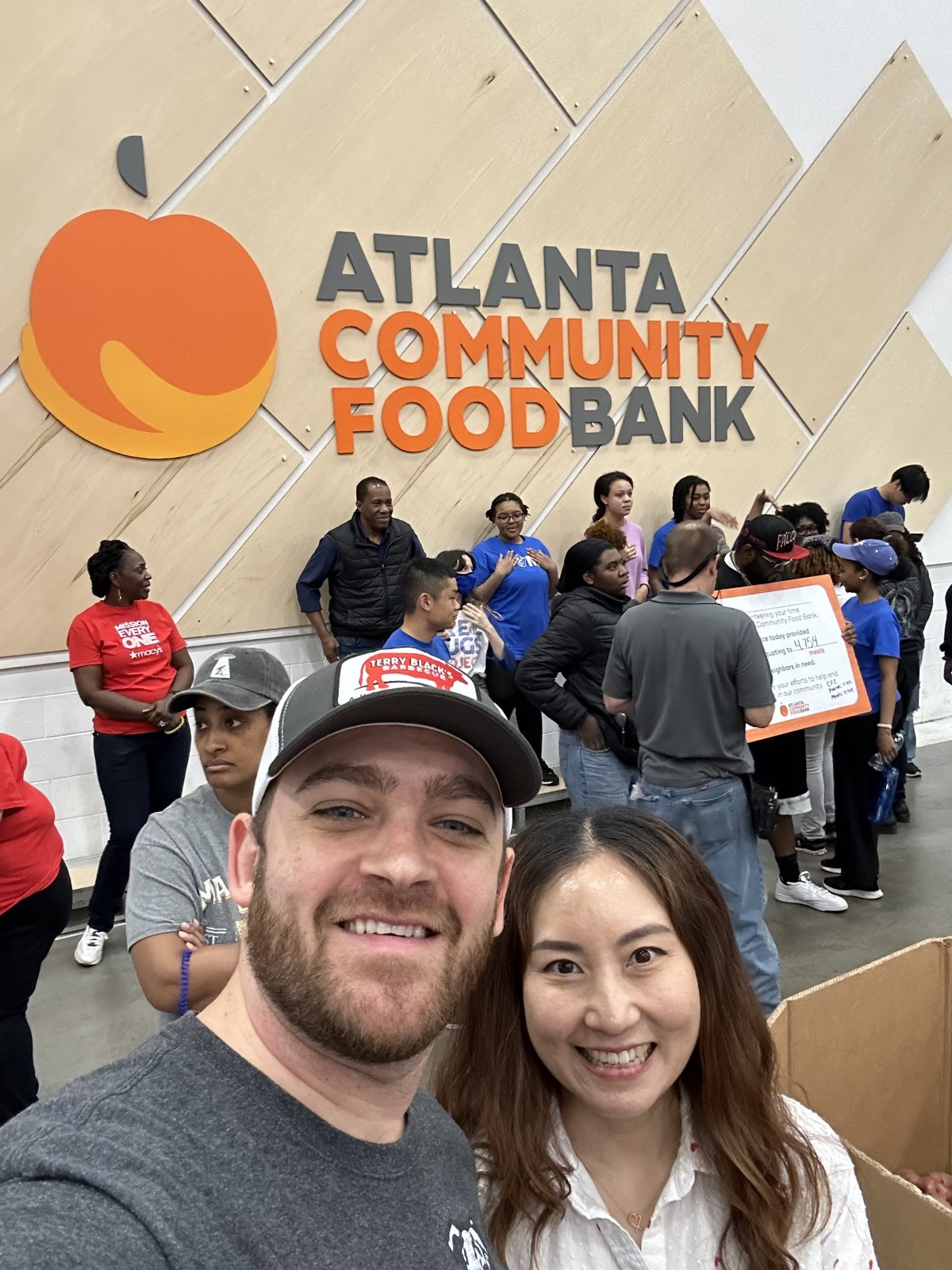 Members of our Atlanta team volunteering at the Atlanta Community Food Bank.